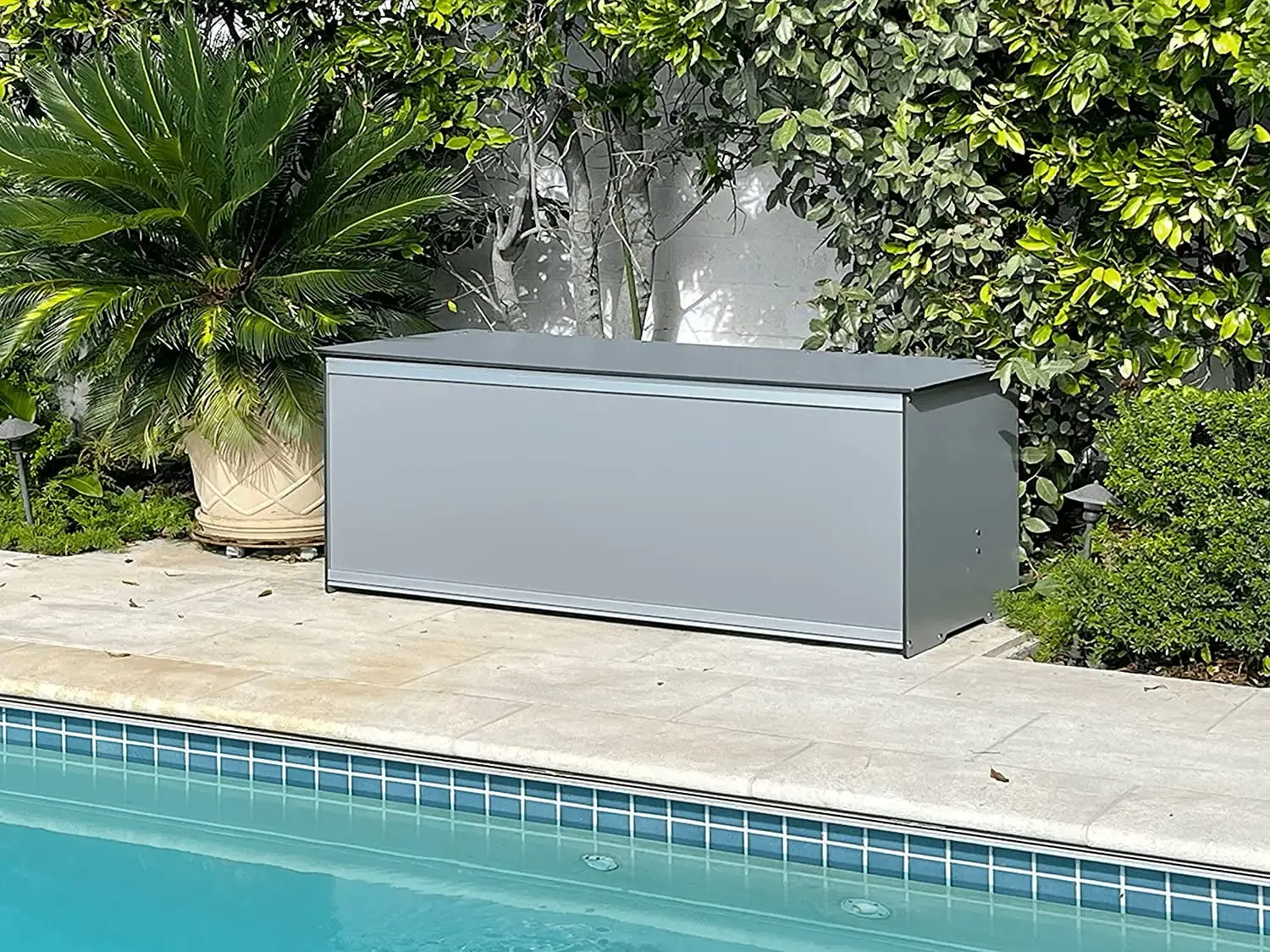 Foreman 120 Gallon Large Deck Box made from Compact Laminate and Anodized Aluminum with a Dark Grey Seat Cushion. removable Machine Washable cover and Graphite colored All Weather Nylon Deck Box cover